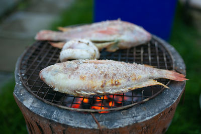 Close-up of meat on barbecue grill