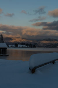 Scenic view of lake against sky during sunset