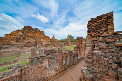 Old ruins of building against sky