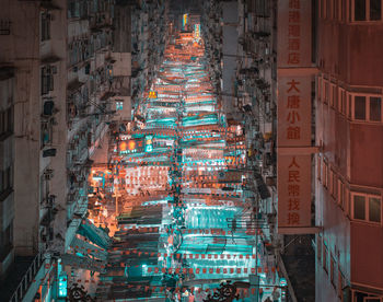 Buntings hanging in illuminated city at night
