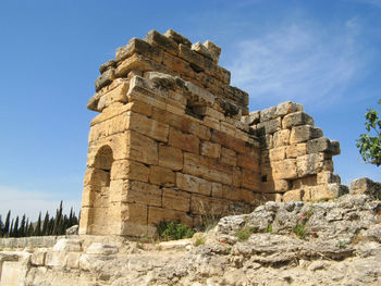 Remaining stone walls of the nymphaeum of hierapolis.