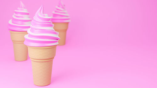 Close-up of ice cream against colored background