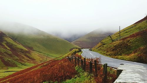 Road leading towards mountains