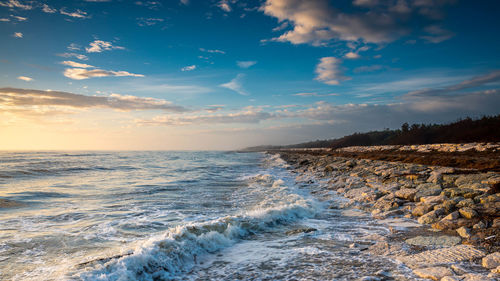 Scenic view of sea against sky during sunset