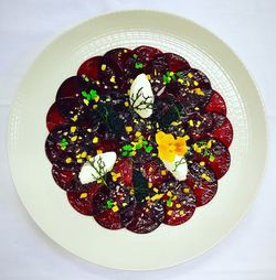 Directly above shot of ice cream in plate on table