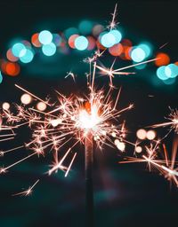 Close-up of sparkler at night