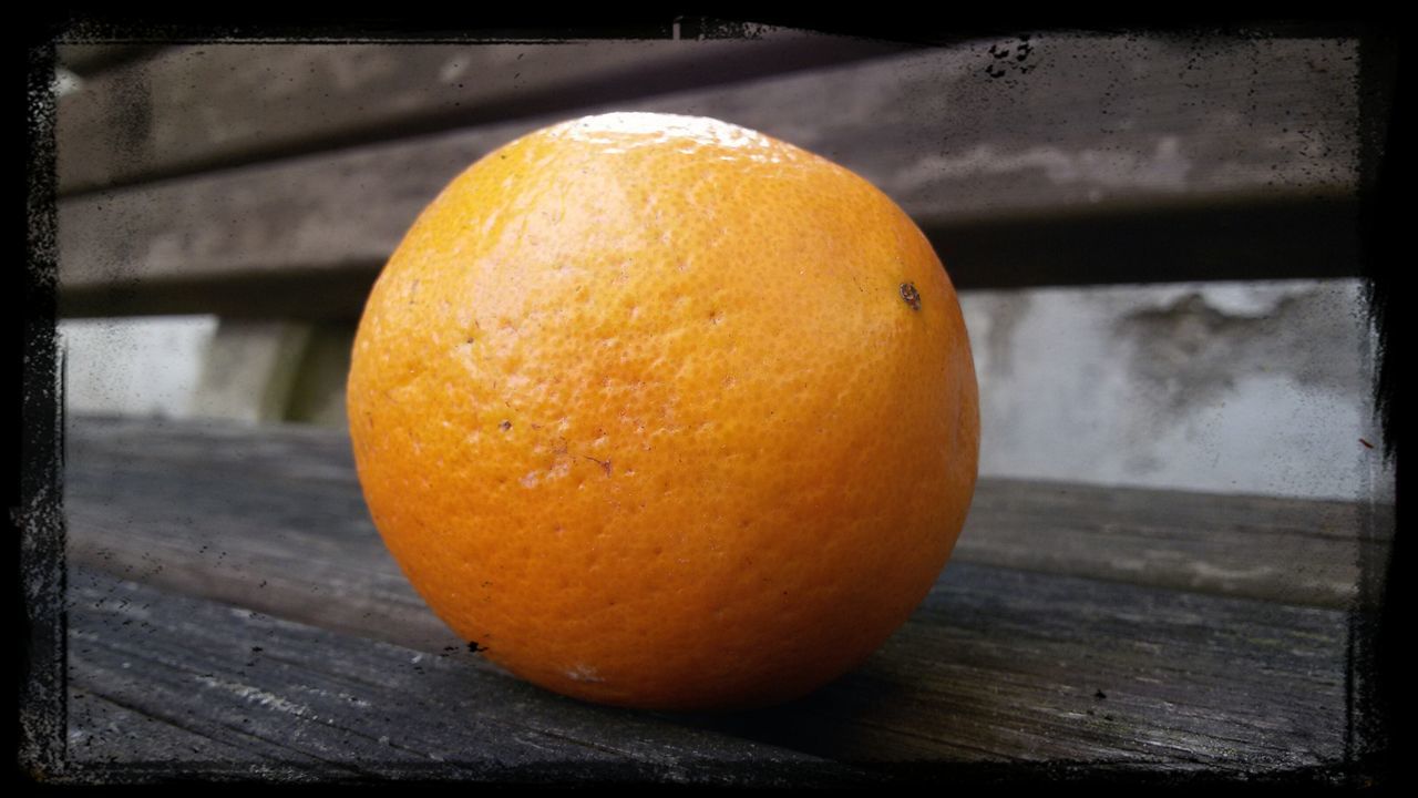 food and drink, fruit, food, healthy eating, freshness, close-up, still life, orange color, indoors, table, orange - fruit, wood - material, yellow, citrus fruit, focus on foreground, transfer print, auto post production filter, wooden, pumpkin, ripe