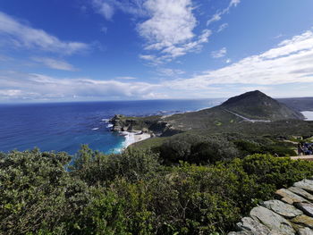 Scenic view of sea against blue sky