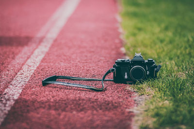 Close-up of camera on grass