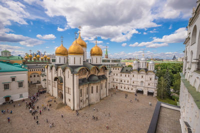 Panoramic view of buildings in city against sky