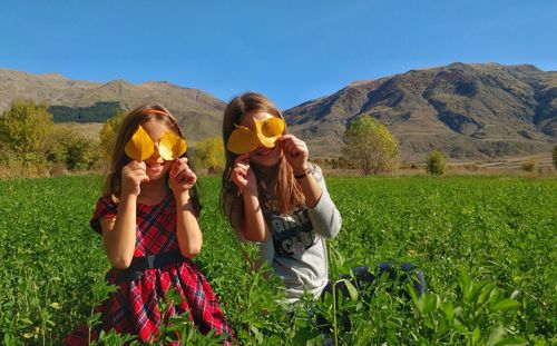 Playful girls enjoying a nice autumn day