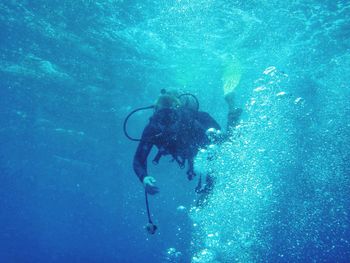 Person swimming in sea