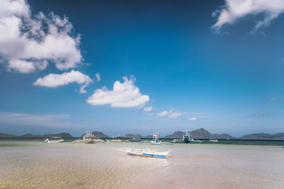 Scenic view of sea against blue sky