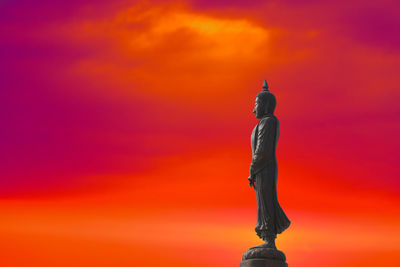 Statue of liberty against sky during sunset