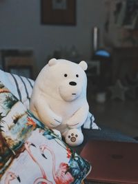 Close-up of stuffed toy on bed at home