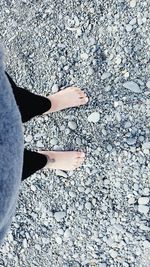 Low section of woman standing on floor