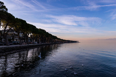 Scenic view of sea against sky at sunset