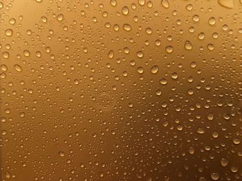 Full frame shot of wet glass window