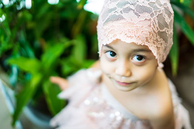 Close-up portrait of cute girl wearing dress