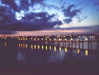 Reflection of illuminated buildings in water