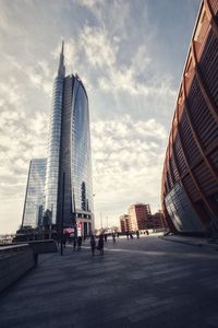 Modern buildings in city against sky