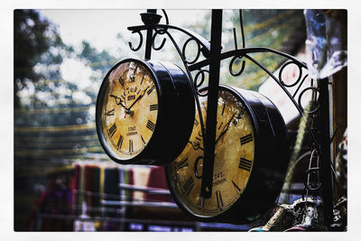 Close-up of clock on bicycle wheel