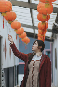 Young woman with chinese lanterns