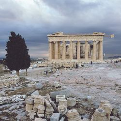 View of historical building against cloudy sky