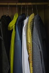 Clothes hanging on rack in store