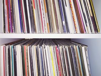 Full frame shot of colorful books on shelf