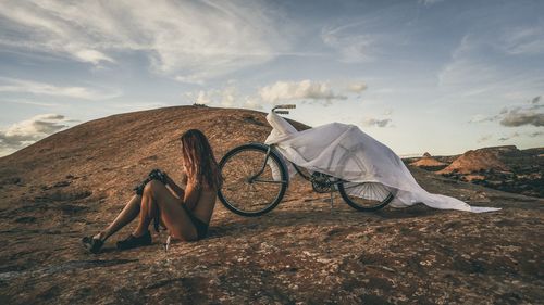 Low section of man riding bicycle