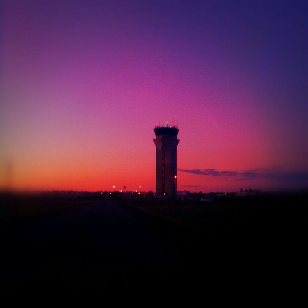 sunset, lighthouse, built structure, guidance, architecture, sky, copy space, silhouette, tranquil scene, orange color, building exterior, tranquility, landscape, scenics, dusk, direction, nature, beauty in nature, red, no people