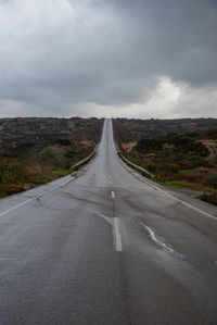 Empty asphalt highway road and stormy sky. concept of achieving goals.