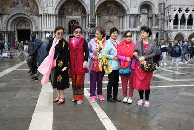 Group of people in front of building