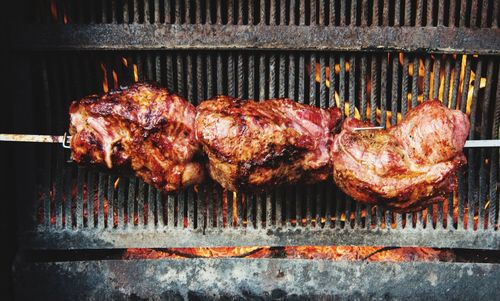 Close-up of meat on barbecue grill