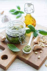 Fresh made pesto sauce. green basil pesto. ingredient for pesto sauce 