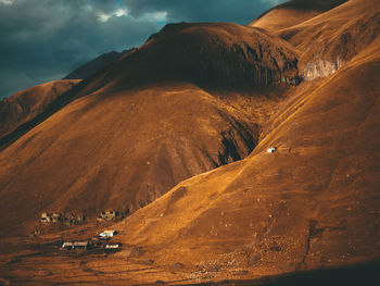 Scenic view of landscape and mountains against sky