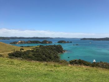 High angle view of sea against blue sky