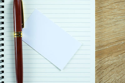 High angle view of white paper on table