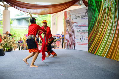 People walking on street in city