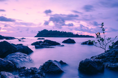 Scenic view of sea against sky at sunset