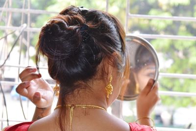 Rear view portrait of woman