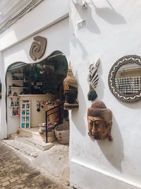 Statues on wall of building