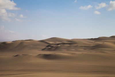 Scenic view of desert against sky