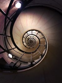 Directly below shot of spiral staircase in building