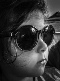 Close-up portrait of man wearing sunglasses