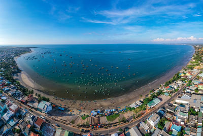 High angle view of beach against sky in city