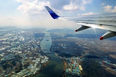 Aerial view of city against sky