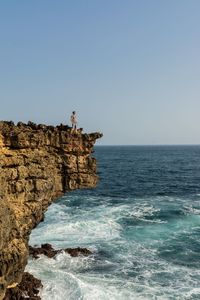 Scenic view of sea against clear sky