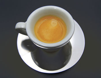 High angle view of coffee on table against black background
